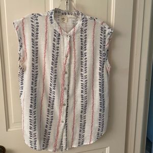 White Crow button down Sleeveless shirt.